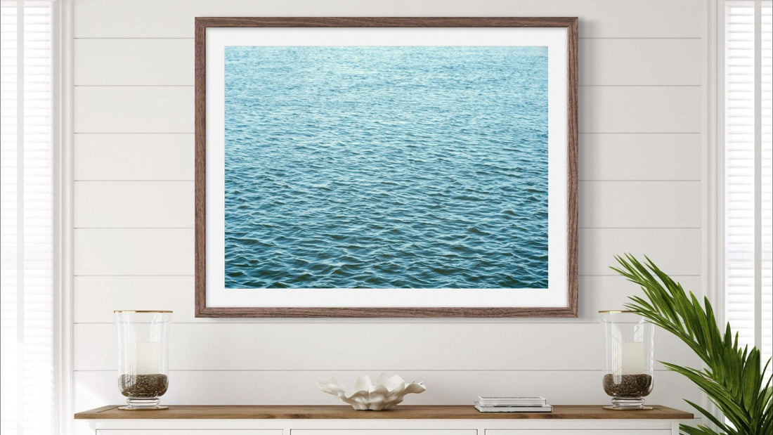 Calm Waters' coastal photography print by Danita Brooks, featuring serene blue ocean waves. The Color Blue - Painting of a Blue Wave in Living Room "Nanosecond" by Danita Brooks