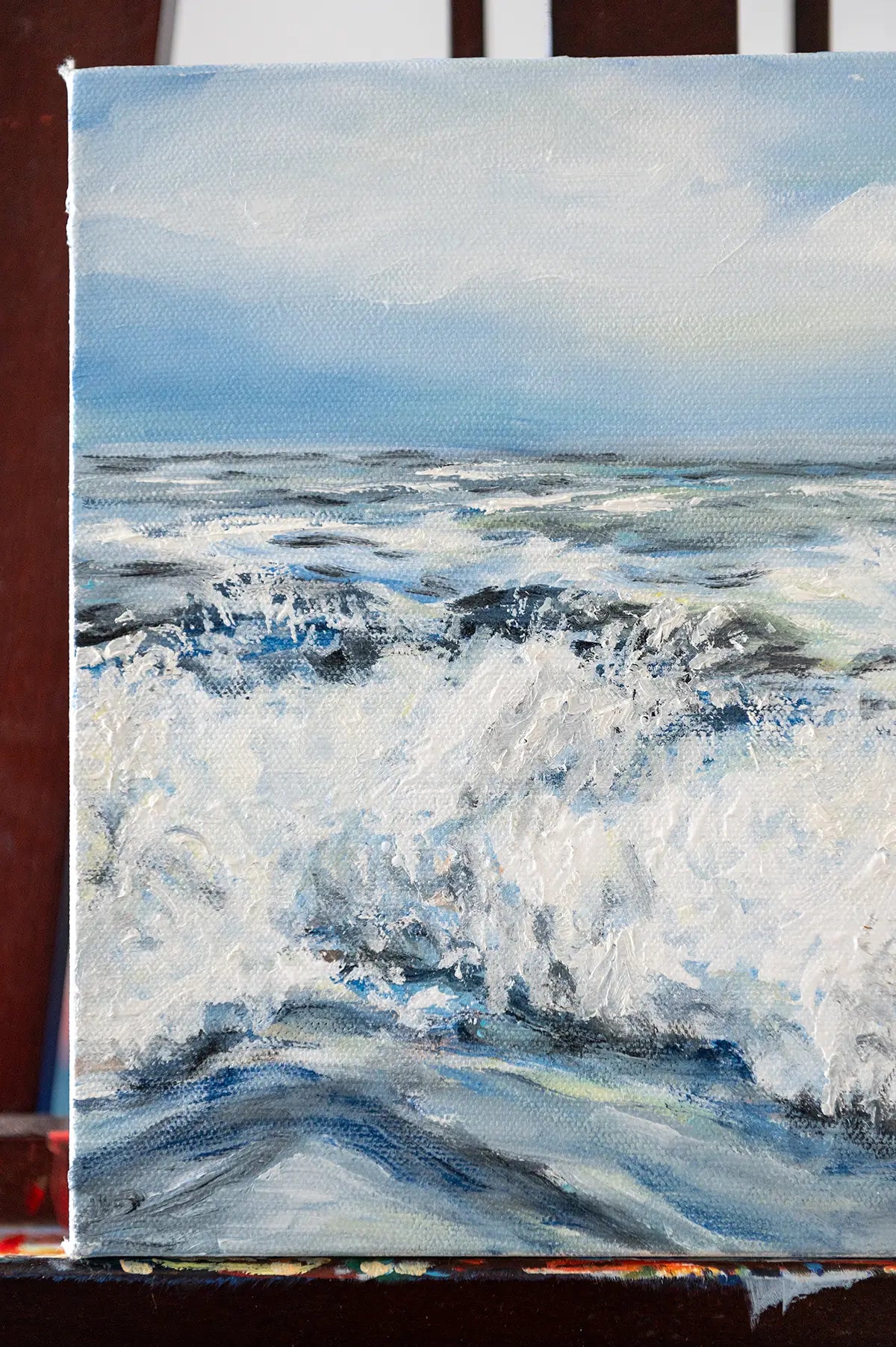 Close-up of wave detail and brush textures in the coastal seascape painting "Alive" by Danita Brooks