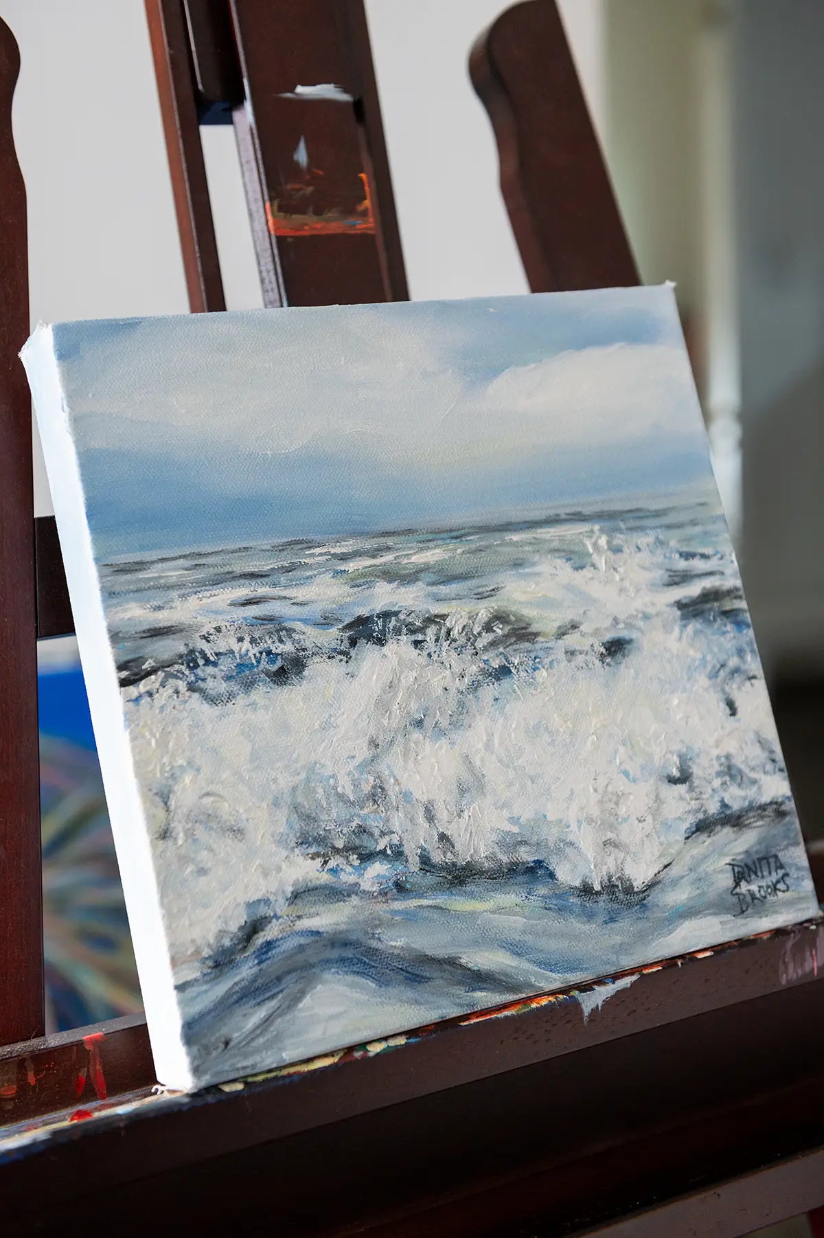 Original oil painting "Alive" by Danita Brooks, angled to highlight the energy and flow of the ocean wave