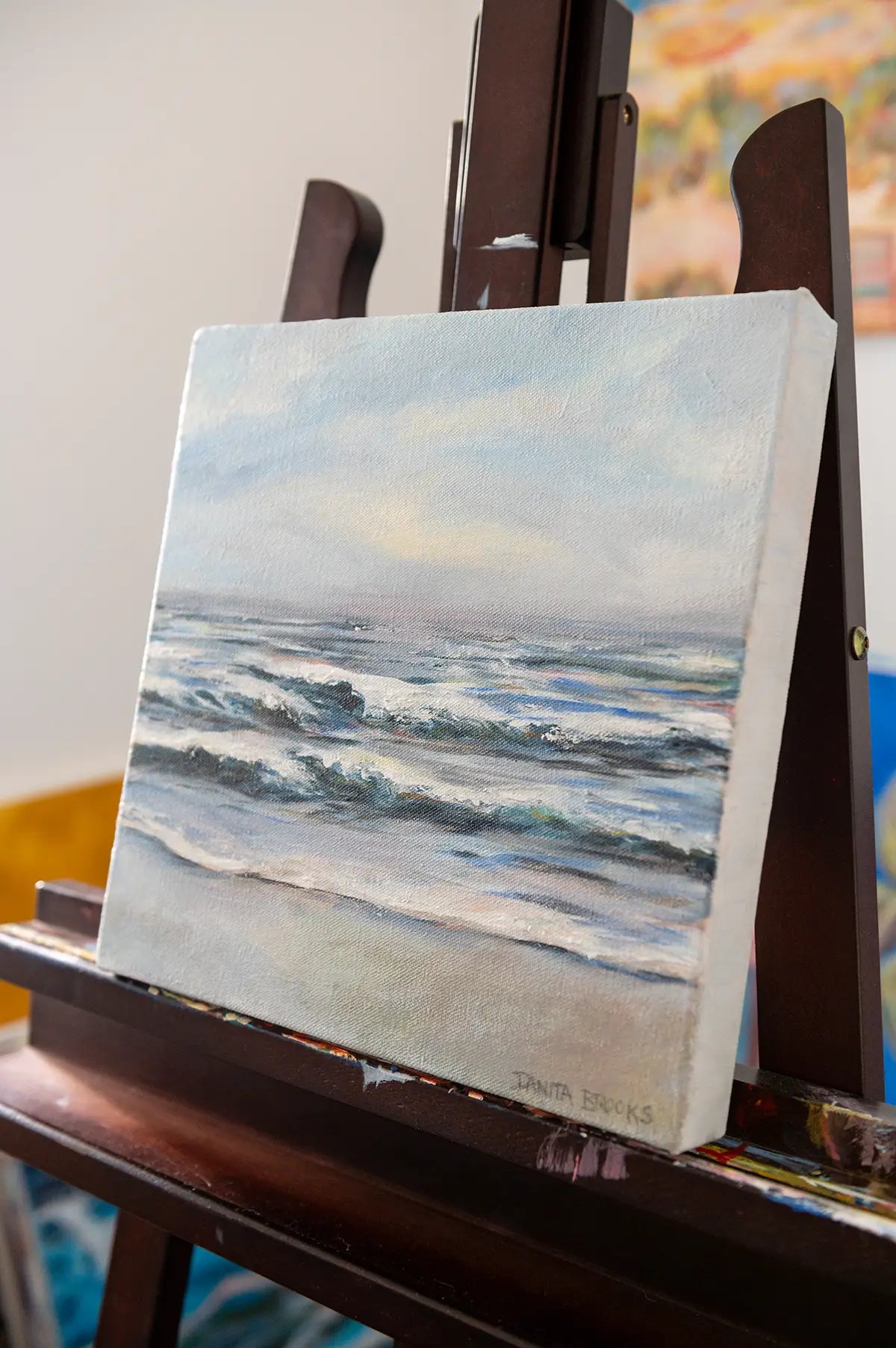 Original ocean painting "Fresh Start" by Danita Brooks, angled to highlight depth and movement of the sea