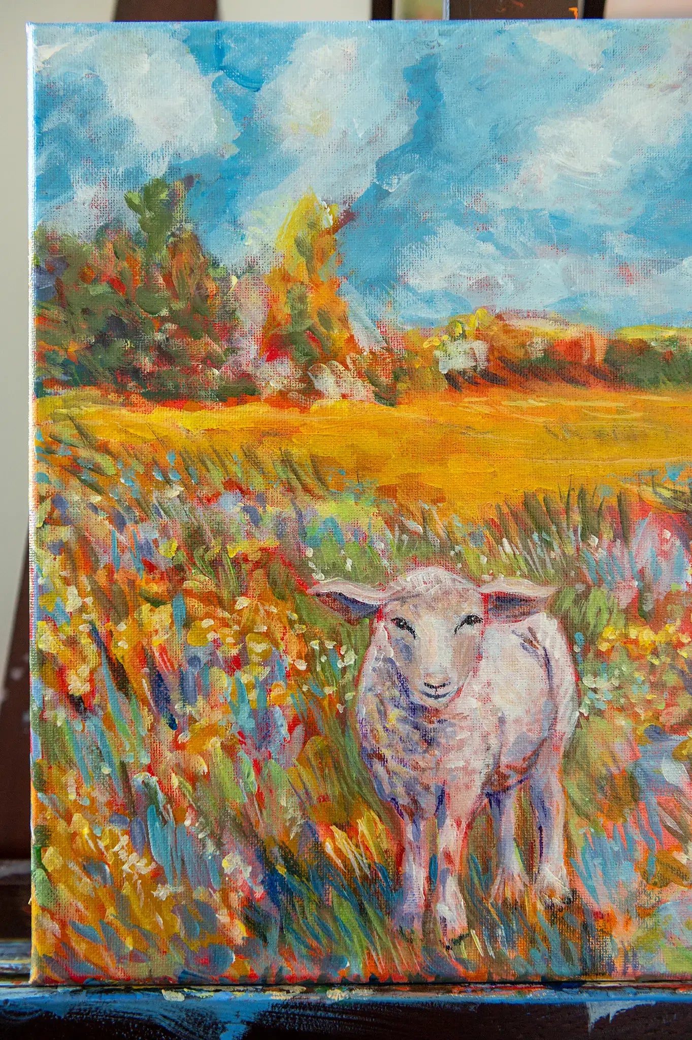 Detail of soft brushstrokes and color palette in “Beloved” lamb painting