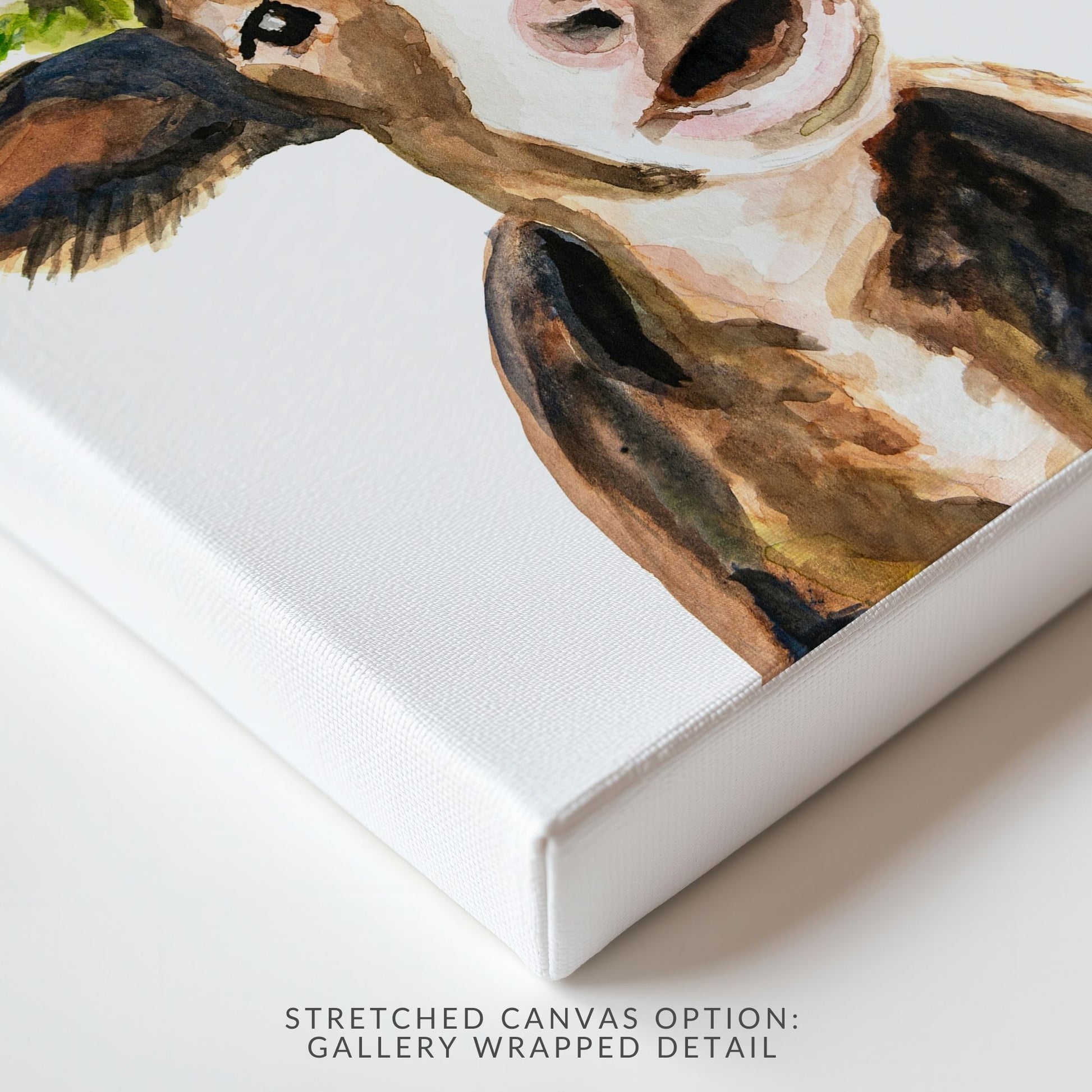 Close up detailed view of stretched canvas of brown cow watercolor print showing soft brush strokes and gentle expression