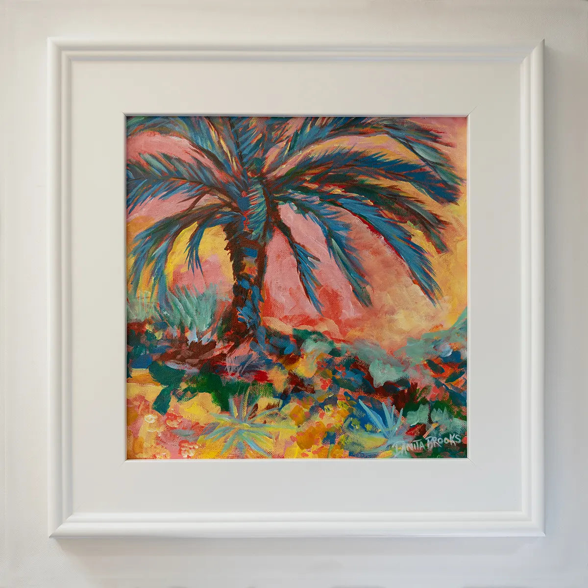 Original palm tree painting titled "Everlasting Sunset" by Danita Brooks, framed in white plein air frame and displayed in natural light