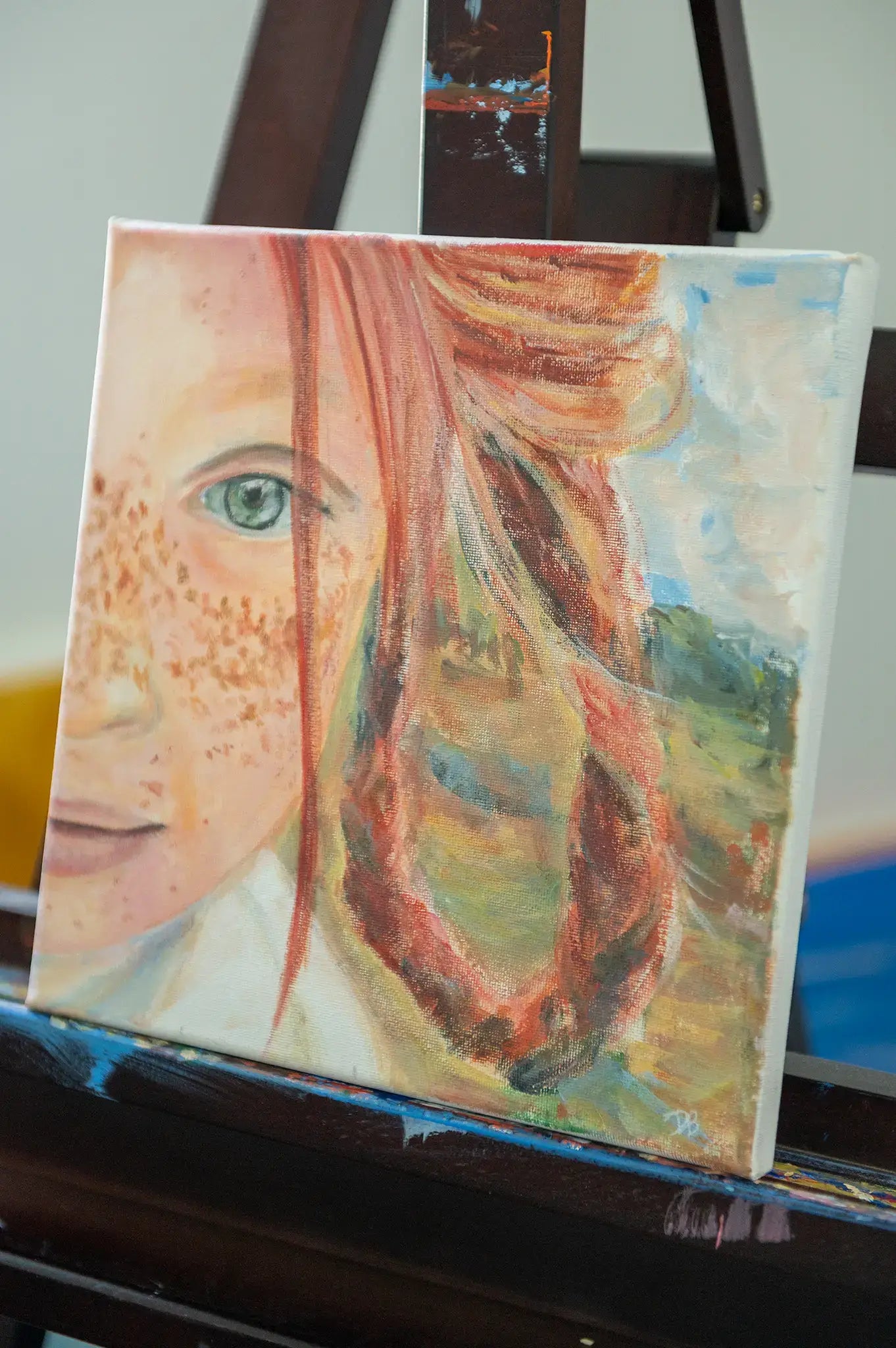 Angled shot of “Freckles” painting highlighting canvas depth and painting layers