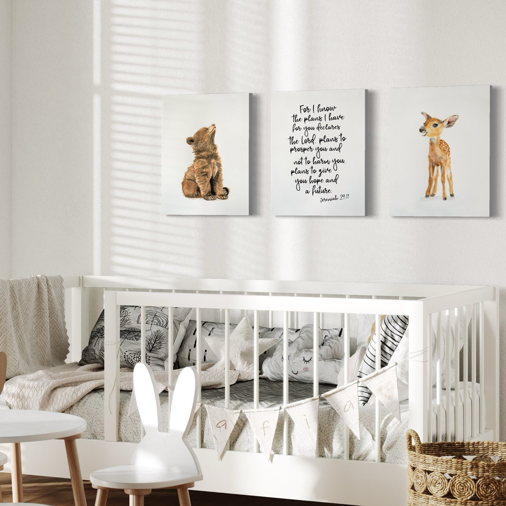 Woodland nursery decorated with stretched canvas prints of baby bear, deer, and Jeremiah 29:11 Bible verse print – Christian nursery wall decor set