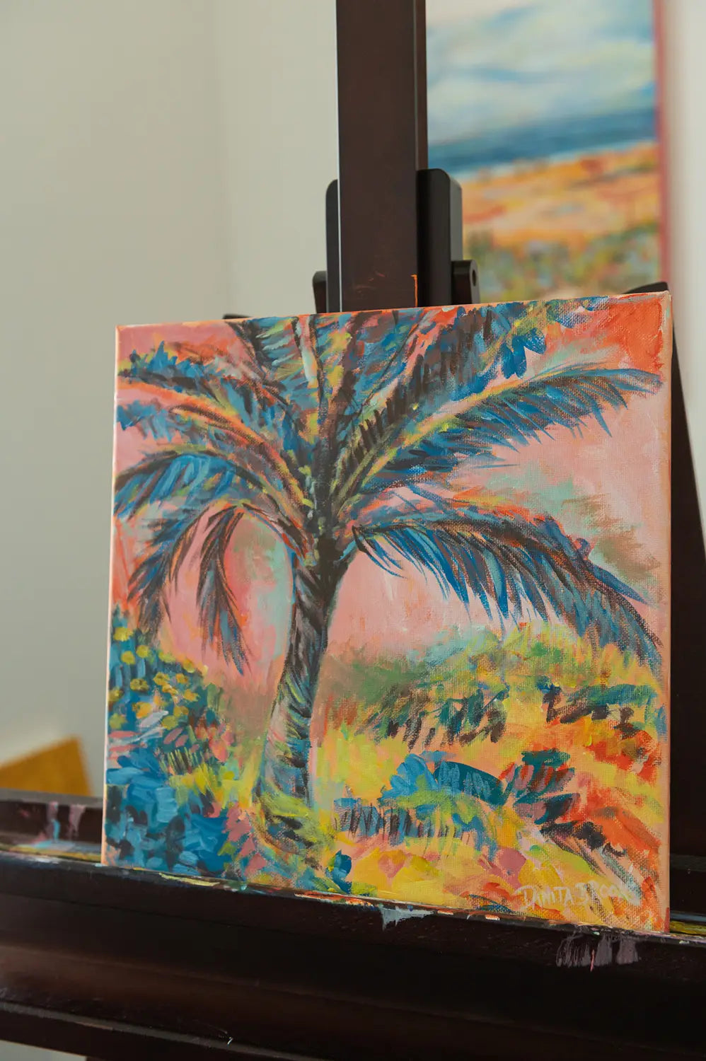 Side view of "Cotton Candy Skies" tropical sunset painting showing pastel pink skies and palm tree silhouette