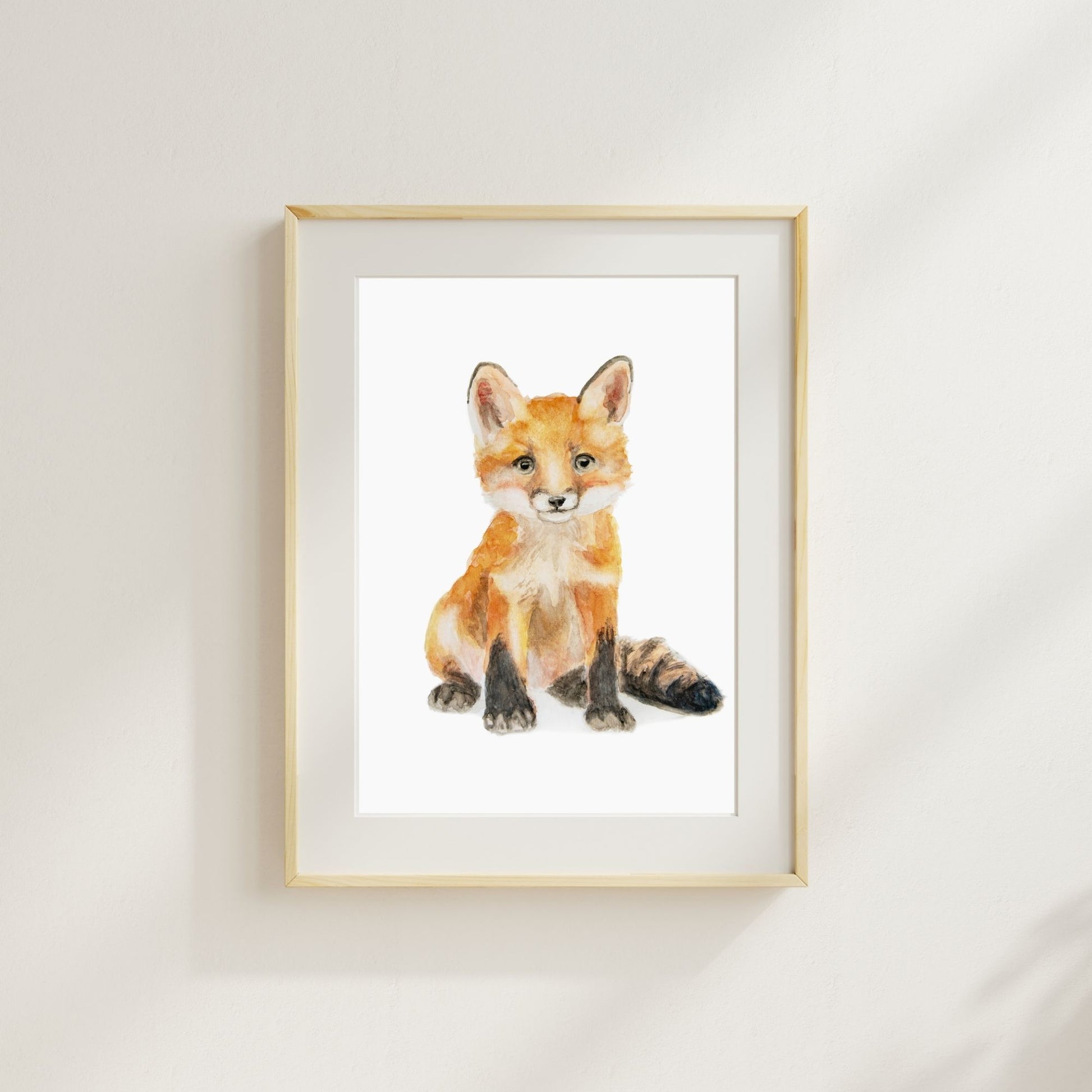 Woodland-themed nursery sitting fox art print – gender-neutral forest animal nursery decor here the fox print is shown in a wood frame with a mat
