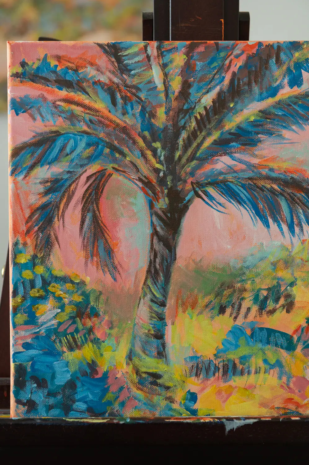 Close-up of cotton candy-colored sky and palm detail in the acrylic painting "Cotton Candy Skies"