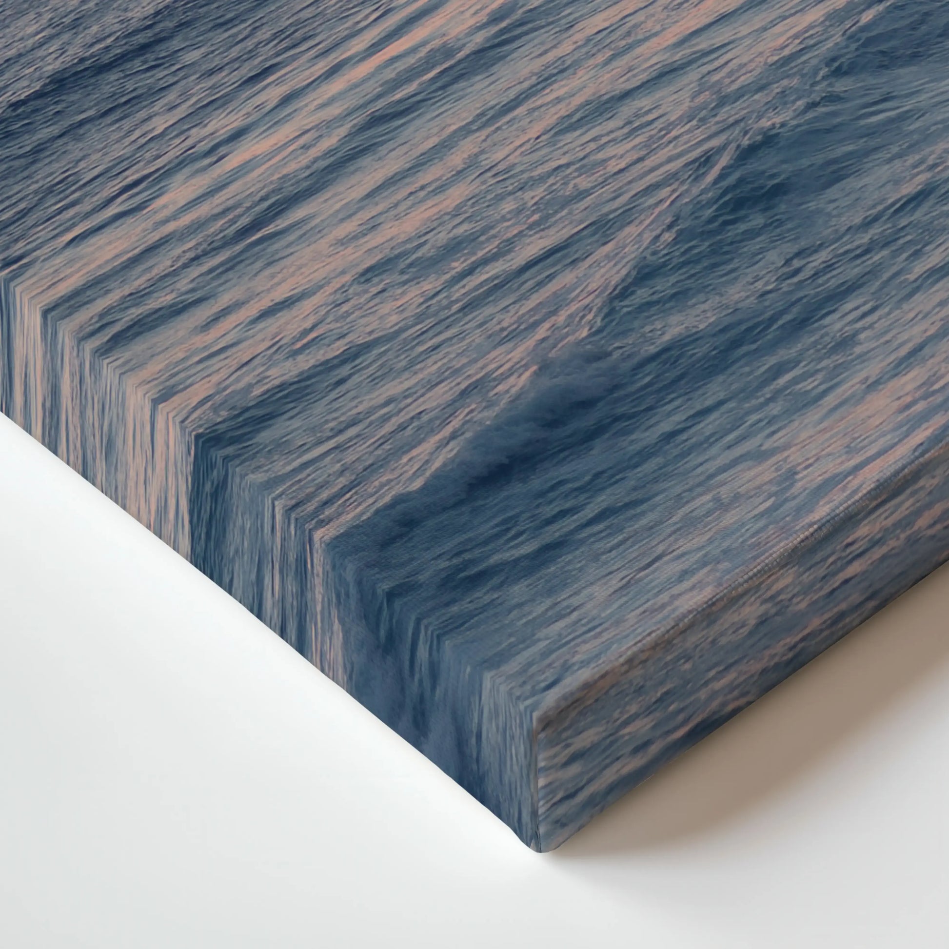 a close up of a wooden surface with waves