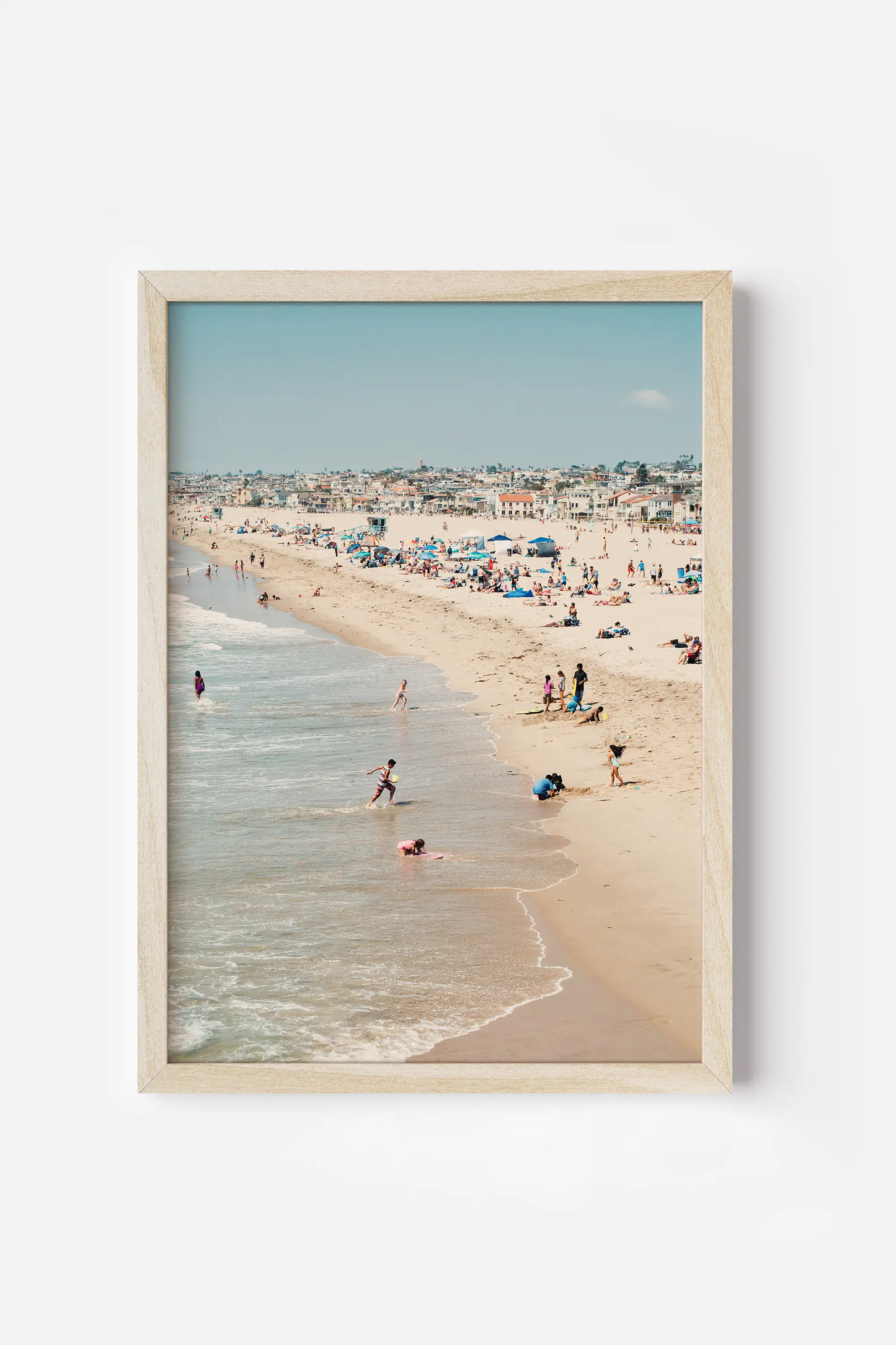 a picture of a beach with people on it