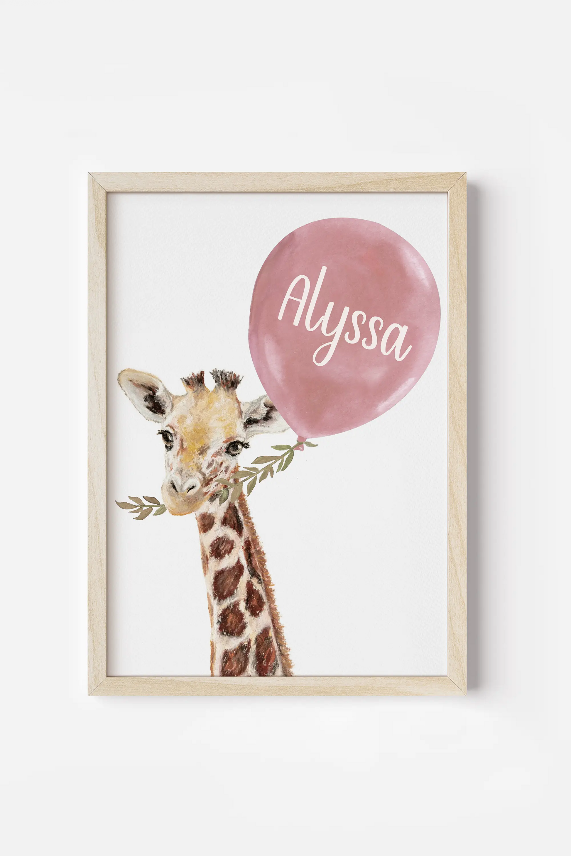 a picture of a giraffe holding a balloon