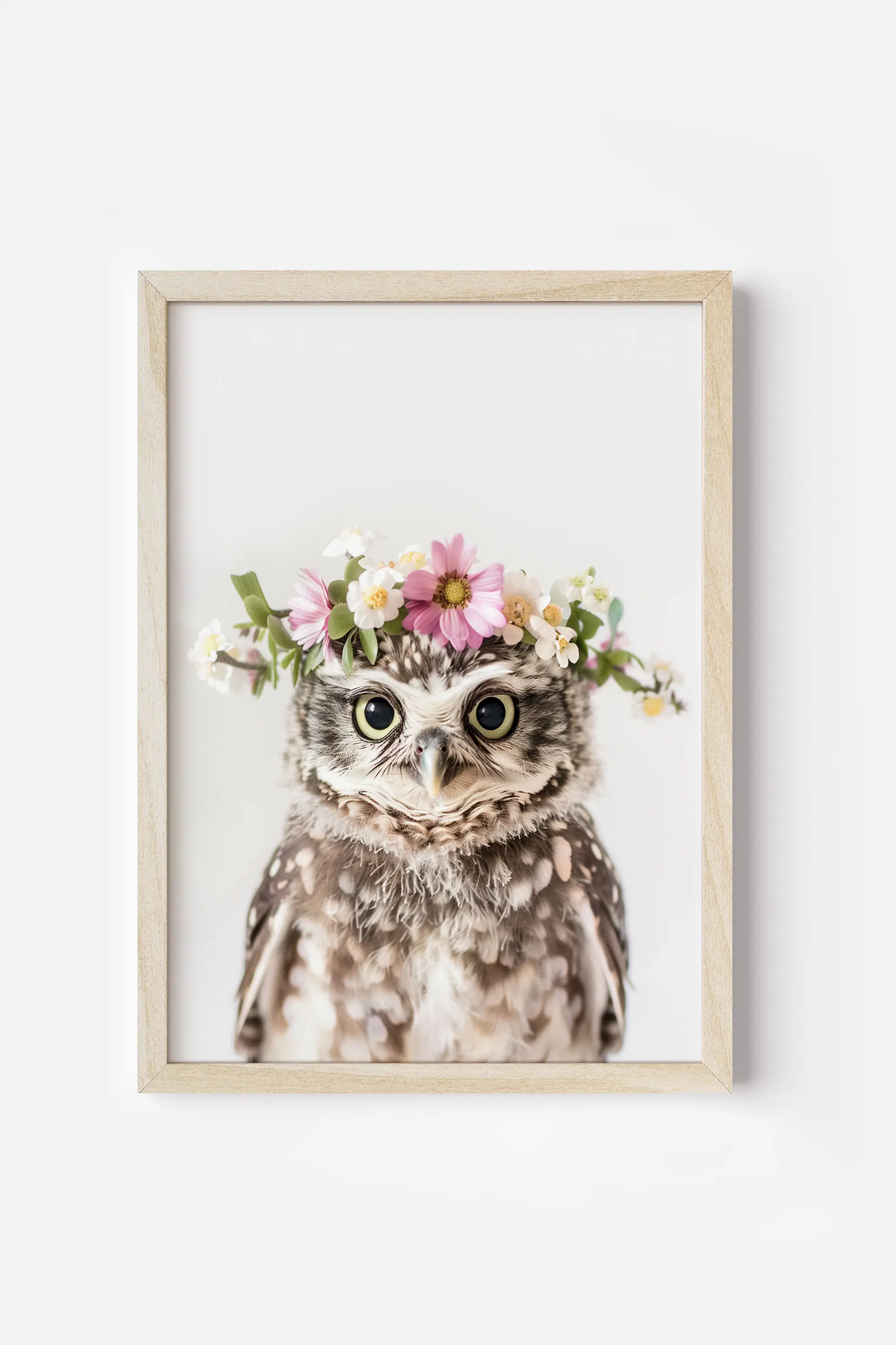 an owl with a flower crown on its head