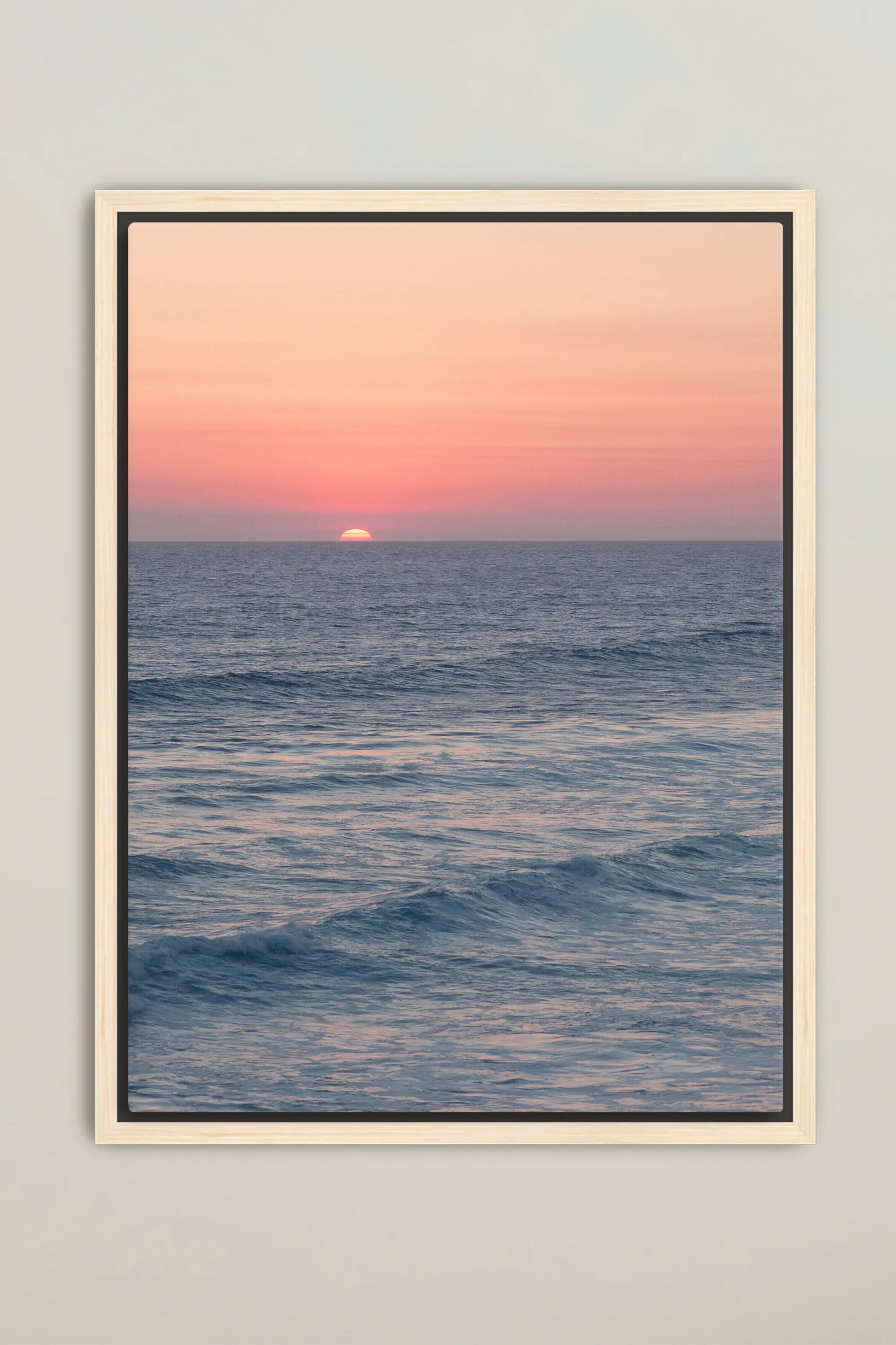 a picture of a sunset over the ocean