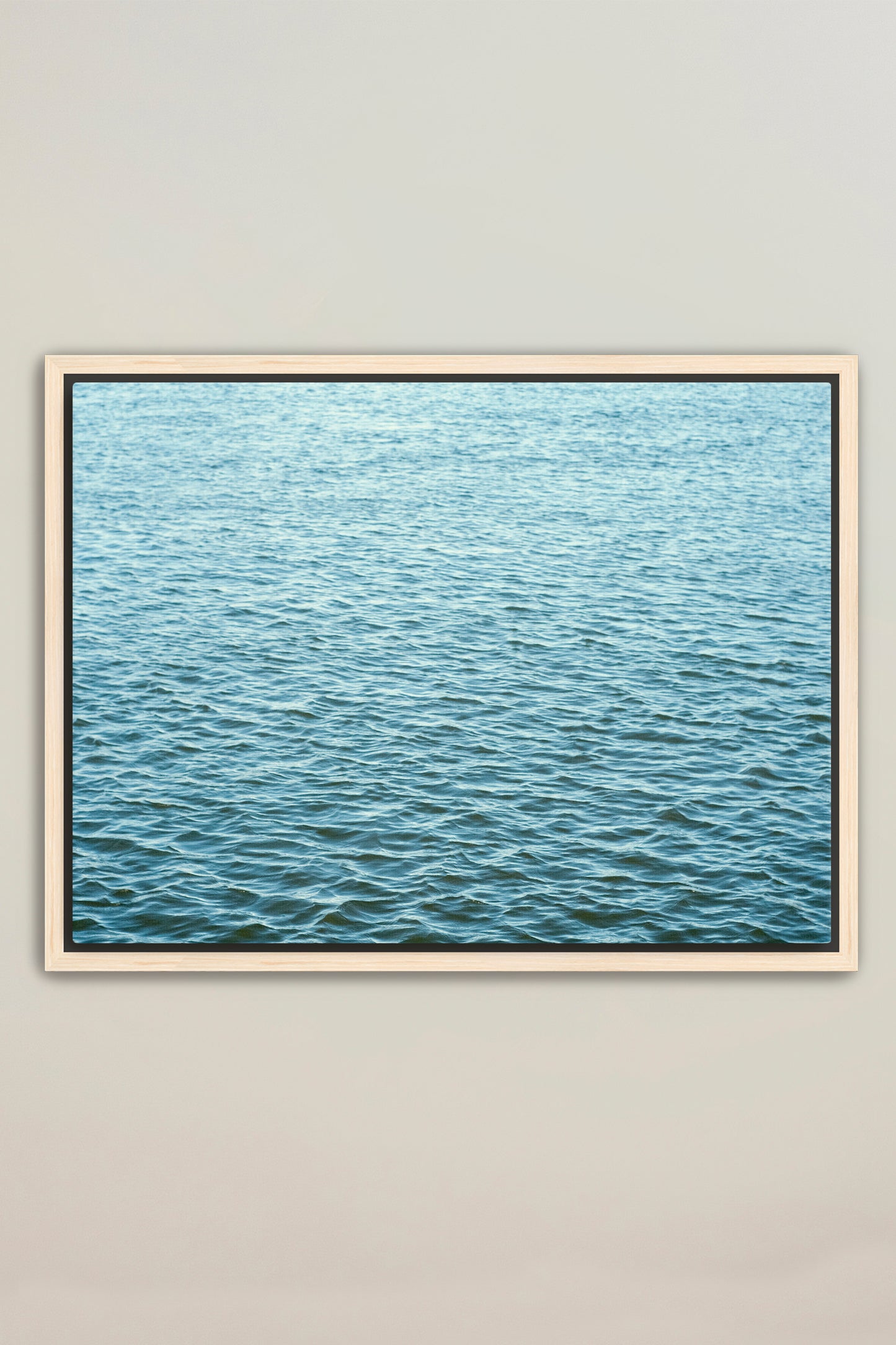 a picture of a body of water in a frame