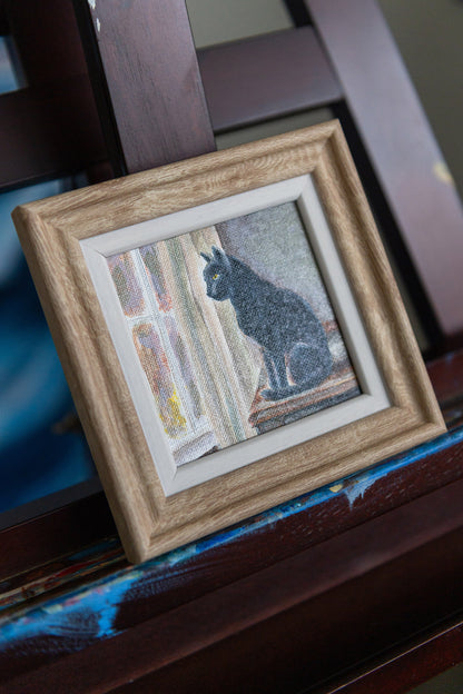 Watching the Light Change – Framed Mini Black Cat Painting