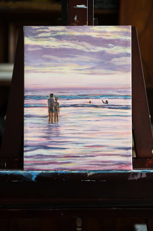 "Nobody Wanted to Leave" original 8x10 painting by Danita Brooks, swimmers in the waves under peach sunset light