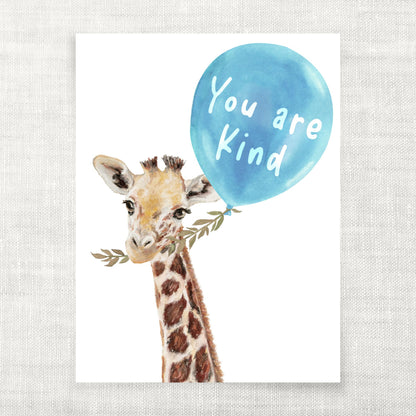 Illustration of a giraffe holding a blue balloon with 'You are Kind' text on a light gray background.