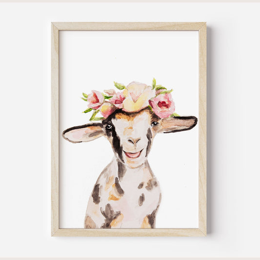 Framed art print of a watercolor goat with a floral crown on a white background