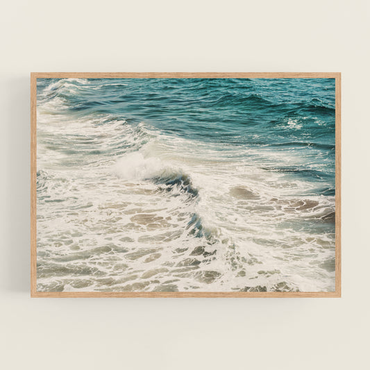 a picture of a wave coming in from the ocean