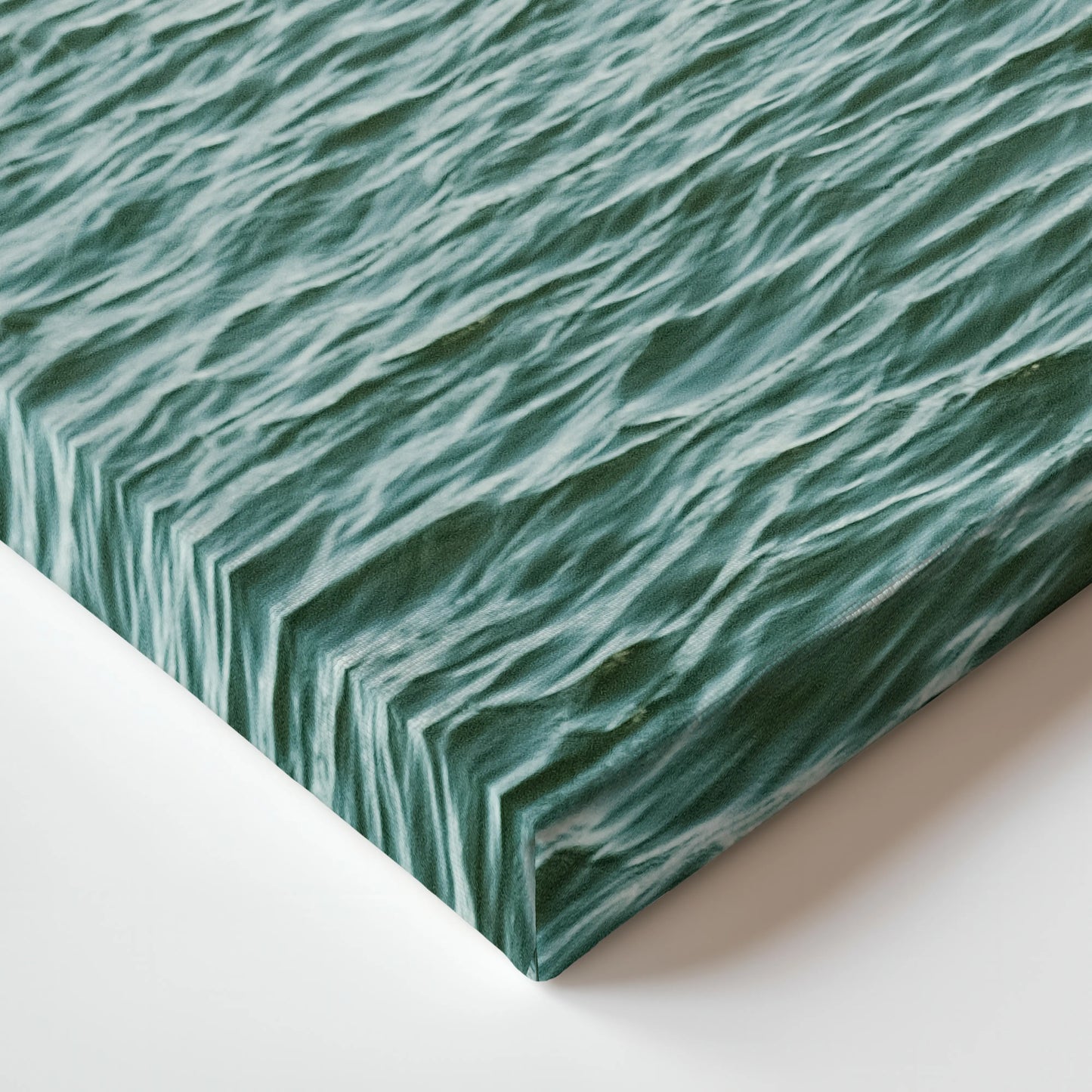 a close up of a green surface with wavy lines