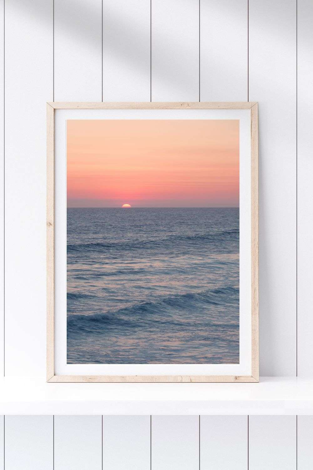 a picture of a sunset over the ocean