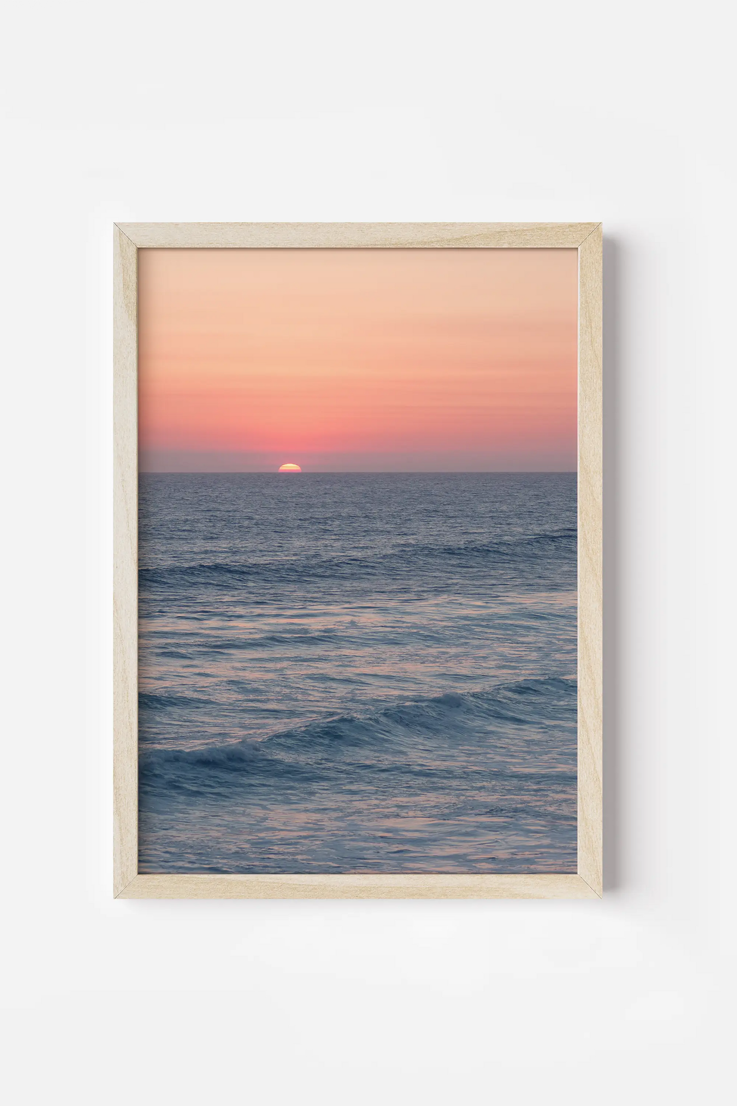 a picture of a sunset over the ocean