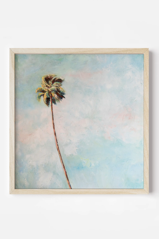 a painting of a palm tree on a wall